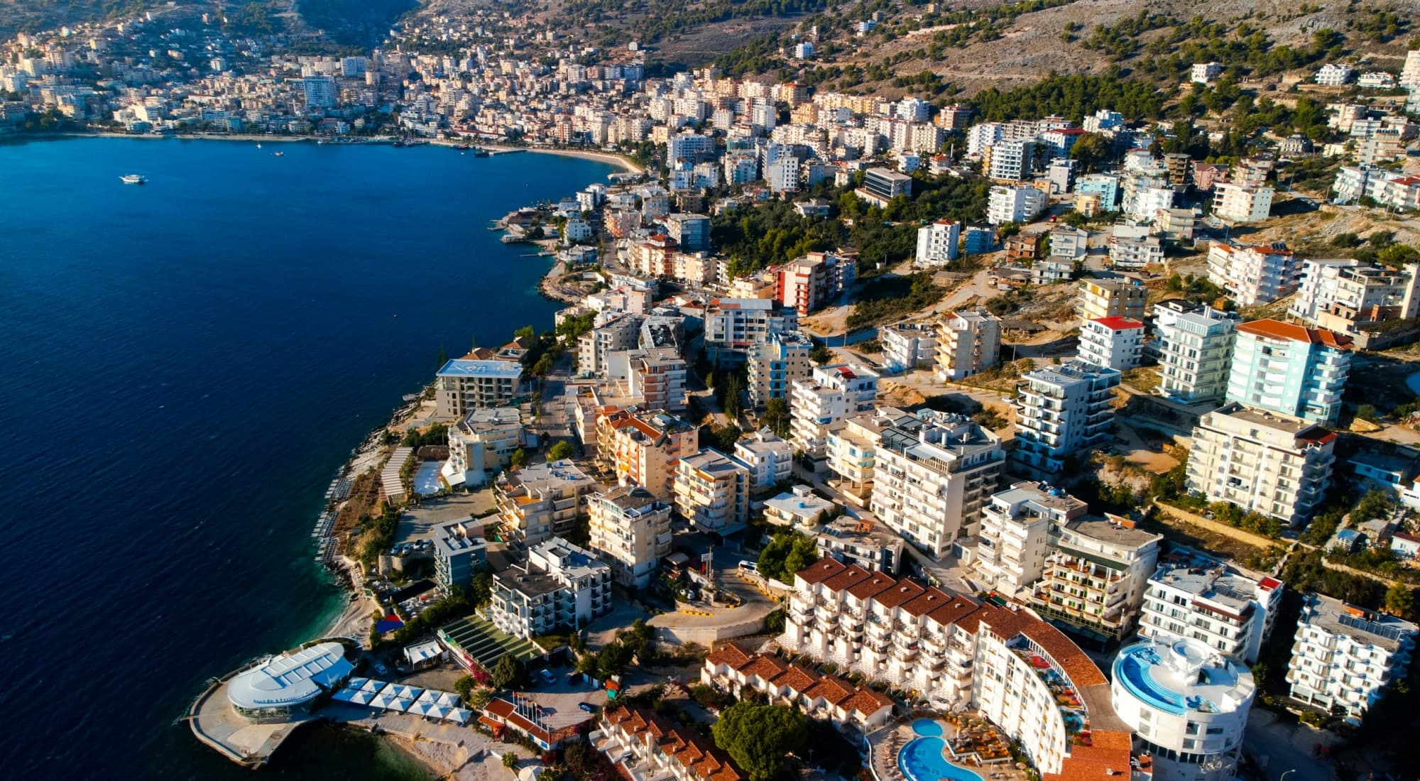 Aerial view of Saranda's bay, with the town running along the shore